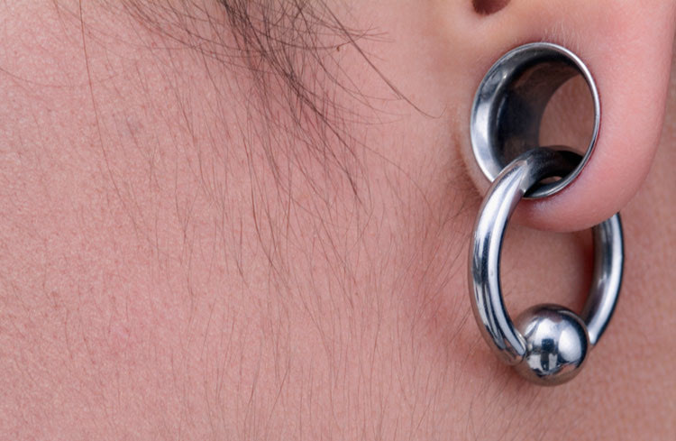 What is the church’s stance on ear gauging and temple recommends?