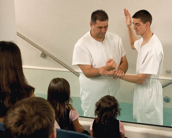 People Gathered Around Someone Being Baptized | LDS Baptismal Prayer & Practices | How Do Mormons Baptize?