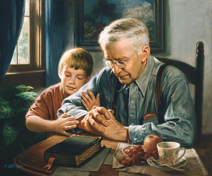 grandfather and grandson praying