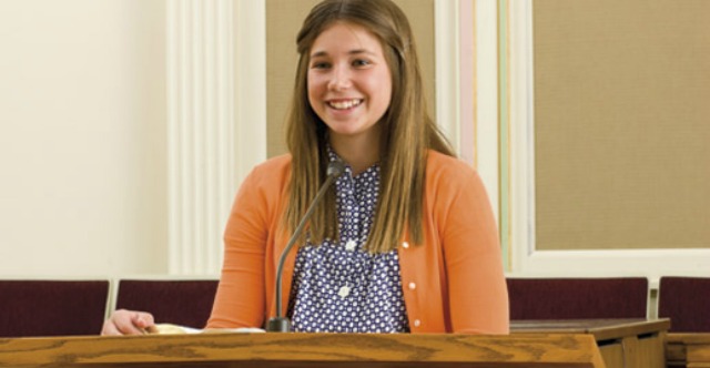 When did it become a practice to have members invited or assigned to give talks in Sacrament Meeting?