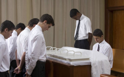 Should chapel doors be open or closed during the Sacrament?