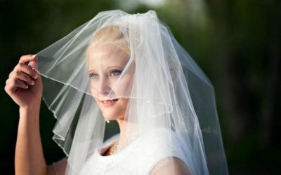 If a woman broke the Law of Chastity, can she still wear a veil during a marriage ceremony?