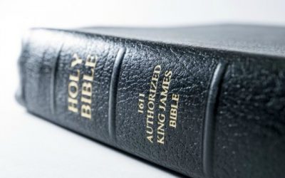 What is John referring to when he says “Do not add to this book?”