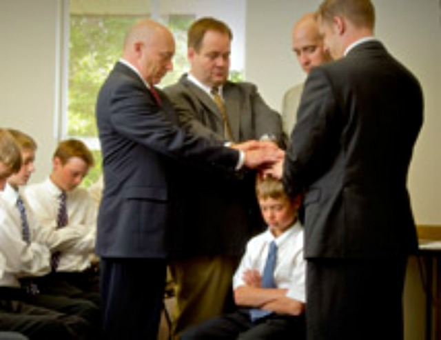 In a divorce situation, who chooses who can ordain to the Aaronic Priesthood?