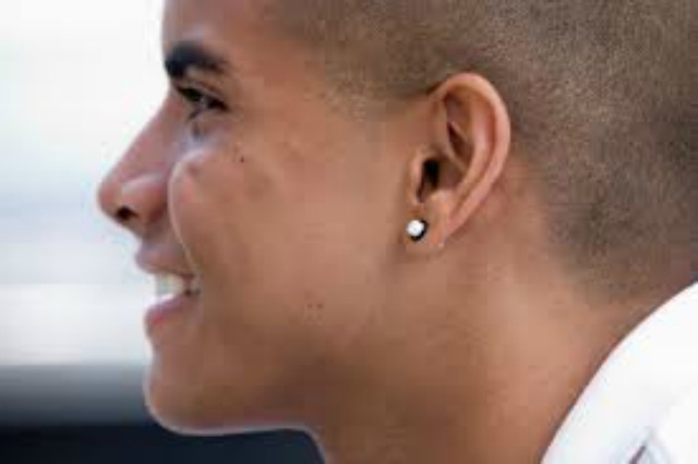 As members of the Church, what can I do to encourage my husband to give up the notion of wearing earrings?