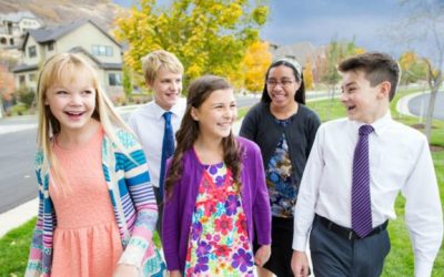 Why are the YM and YW themes worded so differently when referring to heavenly parents?