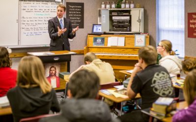 Why does the Church pay seminary and institute teachers?
